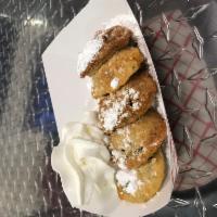 Deep Fried Oreos (5) · Oreos Deep Fried in A Sweet Batter Sprinkled  With Powdered Sugar 