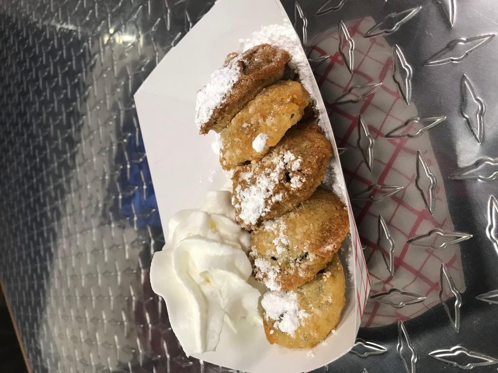 Deep Fried Oreos (5) · Oreos Deep Fried in A Sweet Batter Sprinkled  With Powdered Sugar 