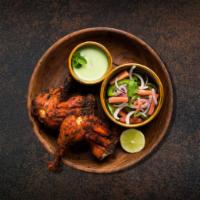 Chicken Tandoor Perfection (4 Pcs) · Marinated in yogurt, fresh ground spices, and cooked in tandoor clay oven.
