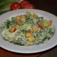 Caesar Salad · Romaine lettuce tossed with creamy Caesar dressing, gourmet 3 cheese blend and seasoned crou...