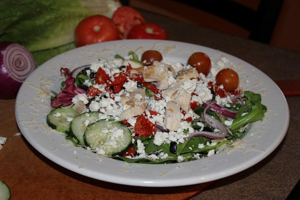 Mediterranean Salad · Romaine and spring mix topped with brick fired chicken, cherry tomatoes, cucumbers, red onions, olives, sun dried tomatoes, feta cheese and gourmet 3 cheese blend. Served with balsamic vinaigrette dressing.