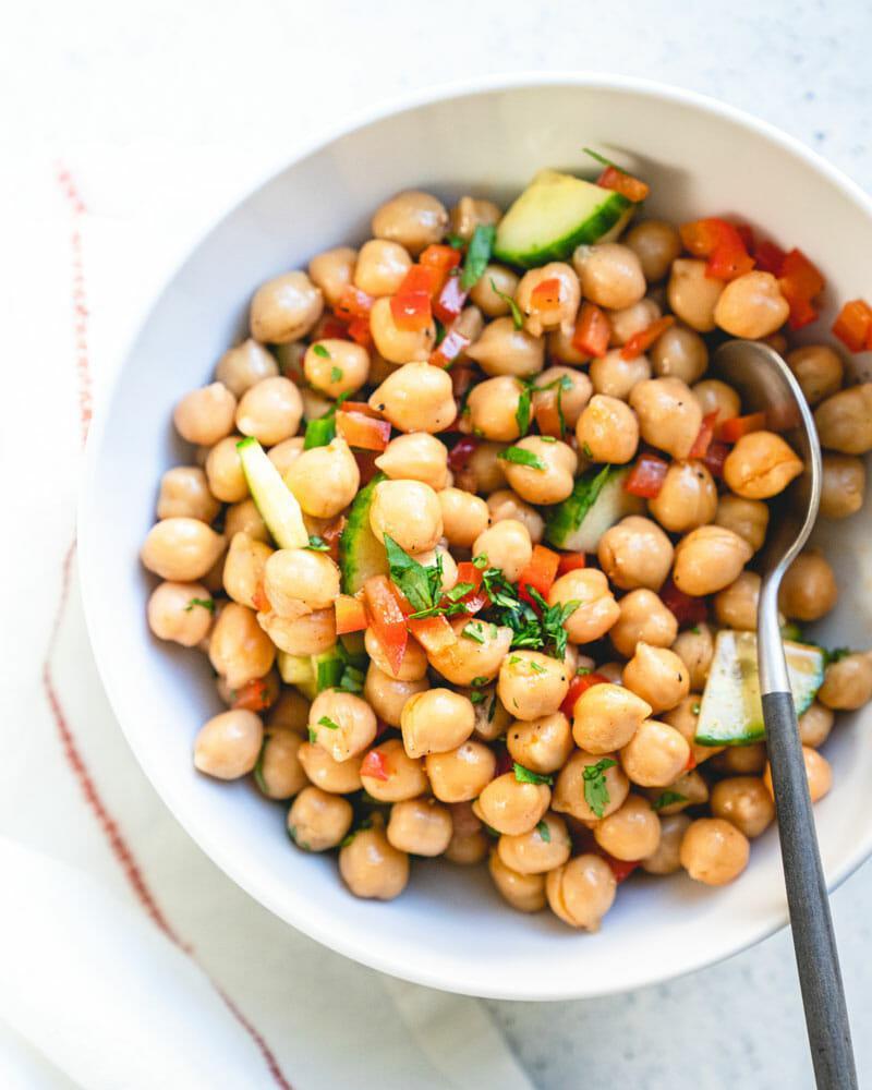 Chickpeas, Garbanzo and Tabouli Salad · Mediterranean style chickpeas made with fresh toppings and finished with lemon juice.  A house favorite!