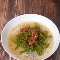 19. Beef Noddle Soup w. Chili Pepper · Savory light broth with noodles.