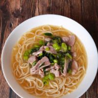20. Shredded Pork & Cabbage Noodle Soup · Savory light broth with noodles.