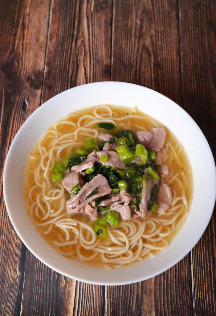 20. Shredded Pork & Cabbage Noodle Soup · Savory light broth with noodles.