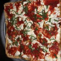 Grandma Pizza · A square pizza with plum tomato sauce, fresh mozzarella cheese, garlic, extra virgin olive o...