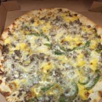 Philly Cheesesteak Pizza · A mix of steak, onion and peppers with yellow American cheese and mozzarella. No sauce