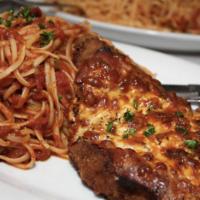 63. Veal Parmigiana Dinner · Fine veal lightly breaded and topped with fresh mozzarella.