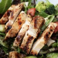 24. Grilled Chicken Salad Special · Char-broiled chicken breast on a bed of mixed greens, tomatoes, garlic, croutons, and grated...