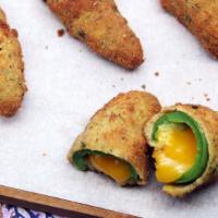 5 Piece Jalapeno Poppers · Jalapeno peppers, cheese fried golden brown and served with marinara sauce. Spicy.