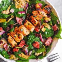 Spinach Salad with Grilled Chicken · Baby spinach topped with marinated grilled chicken, grape tomatoes, red peppers and walnuts ...