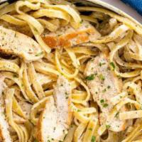 Fettuccine Alfredo Chicken · Grilled chicken with creamy Alfredo sauce topped with Parmesan cheese. Served with hot garli...