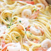 Seafood Pasta (Spicy) · Shrimp and crab meat in a Cajun Alfredo sauce. Served with hot garlic bread. Spicy.