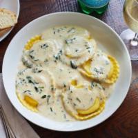Four Cheese Ravioli · Ravioli stuffed with ricotta cheese, cream cheese, mozzarella and provolone. Served in a pes...
