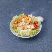 Chicken Caesar Salad · Grilled chicken breast over crispy lettuce, roasted pepper, Parmesan and croutons. Served wi...