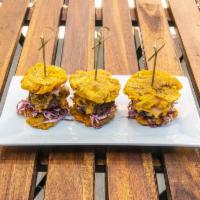 Chimi Sliders · Beef patty, cheddar, red cabbage in house sauce, chimi sauce and fried plantain bun.