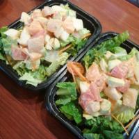 S7. Spicy Sashimi Salad · Tuna, salmon over mix greens with jalapeno sauce.