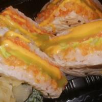 18. Sandwich Roll · Spicy salmon, spicy tuna, and avocado wrapped with sesame soy paper, served with spicy mayo ...