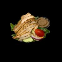 Grilled Chicken Salad · Mesquite char-grilled chicken strips served on a bed of green leaf lettuce, carrots, green p...