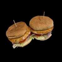 Cajun Salmonburgers Sliders · Two grilled salmon burgers, lettuce, tomatoes, red onions and Cajun mayo on burger buns. Ser...