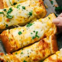 Cheese Garlic Bread · Buttery bread that is topped with garlic and cheese.