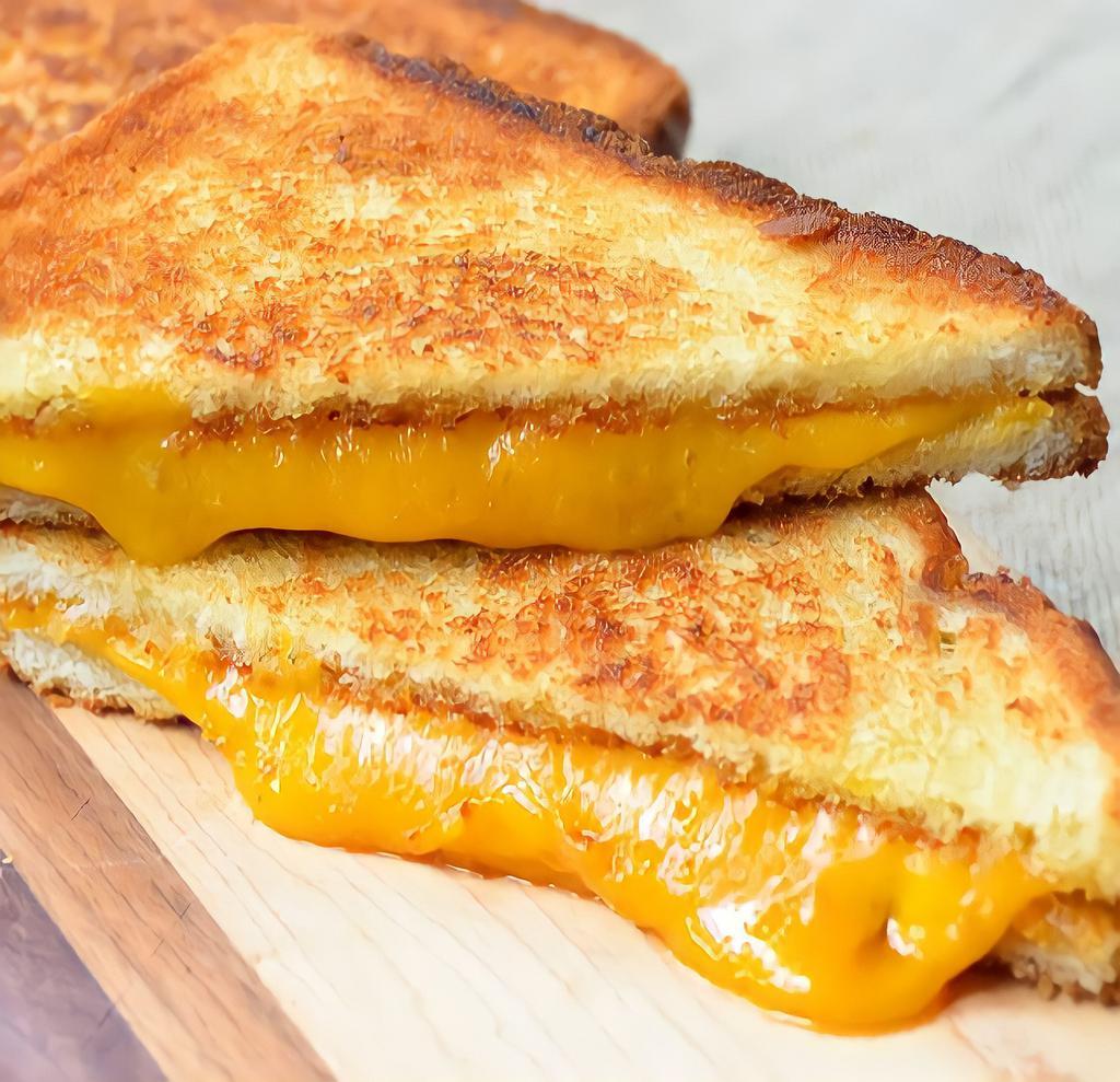 Grilled Cheese Breakfast · melted cheese on a slice bread