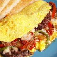 Cheesesteak Omelette · peppers,onions and steak omelette served with home fries and a toast