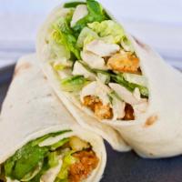 Breaded Chicken Wrap · Breaded chicken, with lettuce, tomato, cheese and mayo on a white wrap