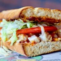 Buffalo Chicken Sandwich · buffallo flavor chicken with cheese, lettuce, tomato and mayonnaise 