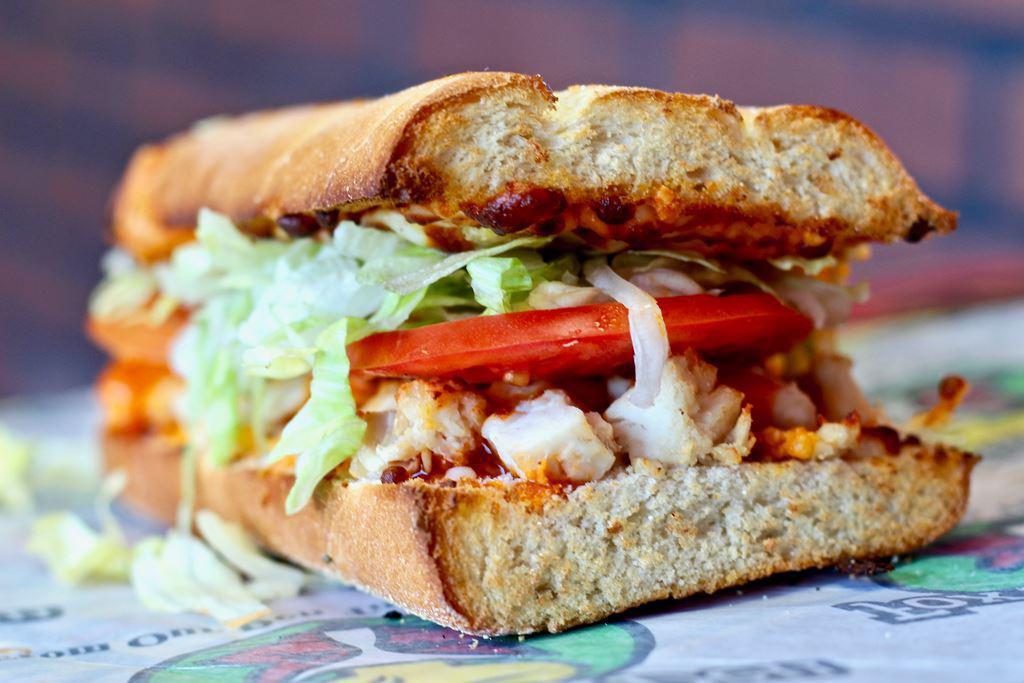 Buffalo Chicken Sandwich · buffallo flavor chicken with cheese, lettuce, tomato and mayonnaise 