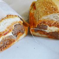 Meatball Parmesan Sandwich · beef meatballs topped with marinara sauce and parmesan cheese 