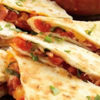Cheese Quesadilla · Cheese Quesadilla with lettuce and tomato on a white tortilla served with sauce and sour cream