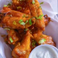8 pieces Buffalo Wings · Cooked wing of a chicken coated in sauce or seasoning. 8 pieces.