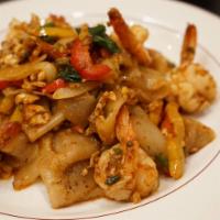 Drunken Noodles 🌶️  · Choice of protein, flat noodles, garlic, onion, chili and basil.