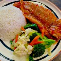 Sweet Chili Fish Fillet · crispy fish fillet coated in sweet chili sauce. Served with steamed vegetables & rice