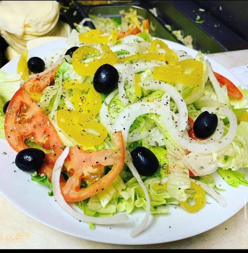 Regular Salad · Iceberg Lettuce, Cherry Tomato, Red Onion, Banana Peppers, Cucumber, Kalamata Olives Topped With House Italian Dressing 