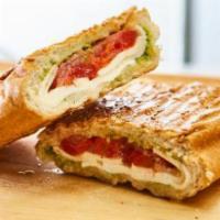 Fresh Mozzarella Hero · Fresh mozzarella, pesto, tomato and sweet red peppers.