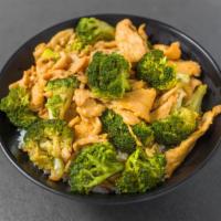 77. Chicken with Broccoli · Served with rice.