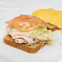 Turkey and Cheese Sandwich · Honestly Turkey with classic American cheese on bread of your choice.