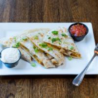 Quesadilla · Served with melted cheddar jack cheese.