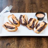 Steak Tips · Served over garlic toast with mozzarella cheese and chipotle mayo.