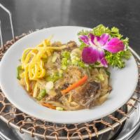 Japchae · Glass sweet potato noodle with sauteed vegetables.