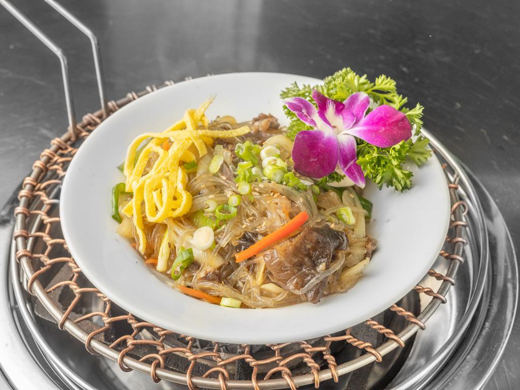 Japchae · Glass sweet potato noodle with sauteed vegetables.