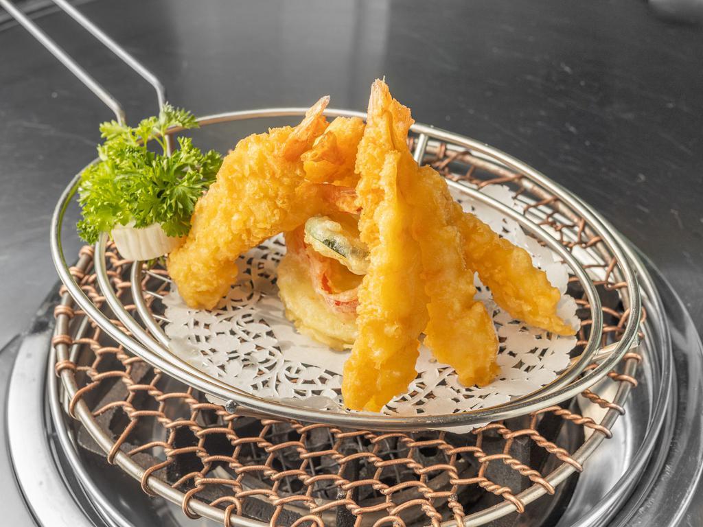 Shrimp Tempura · Large shrimps deep fried in light batter providing that airy crisp