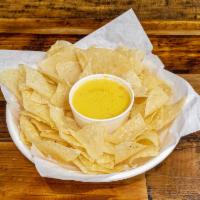 Chips and Queso  · House made chips and creamy queso dip