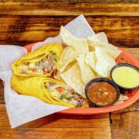 Beef Chimichangas · Beef with grilled onions, mushrooms, bell peppers, and queso. Wrapped in a southwest tortill...
