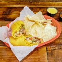 Chicken Chimichanga · Chicken with grilled onions, mushrooms, bell peppers, and queso. Wrapped in a southwest tort...