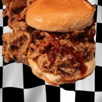 23. Pulled Pork Sandwich  · Slow Smoked with Victory Lane BBQ’s Award-Winning Competition Rib Rub that melts in your mou...