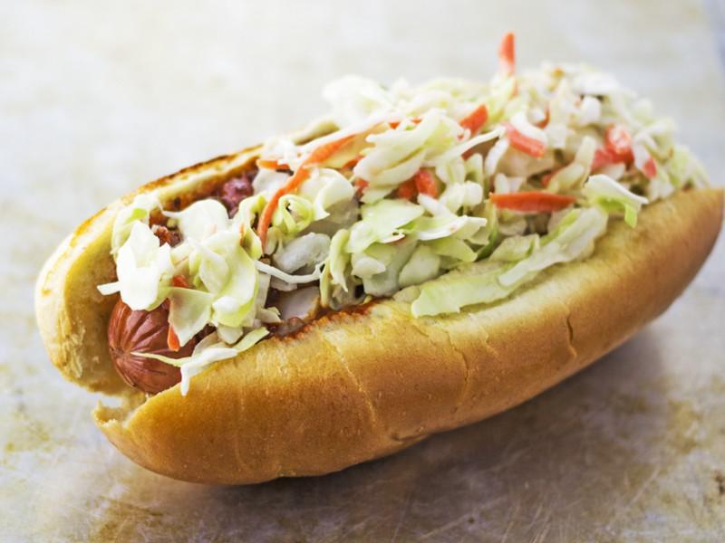 Slaw Dog · VLBBQ's delicious Cole Slaw on top of a All Beef Large Hot Dog w/ VLBBQ's Award Winning BBQ Sauce & a Bag of Lay's Potato Chips!