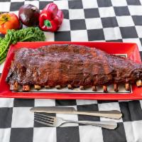 103. Full Slab Rib Plate  · Full Slab Baby Back Ribs with with 2 of our Signature Sides and a Choice our Award-Winning B...